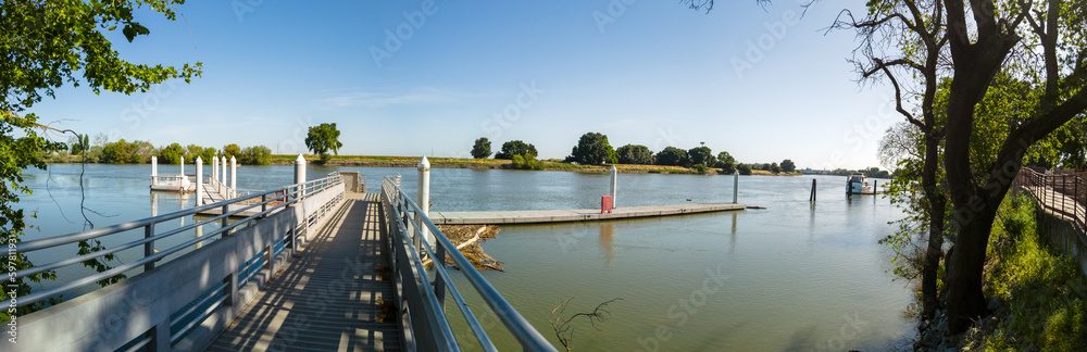 Panoramic view of a boat dock on the sacramento river in the delta 
