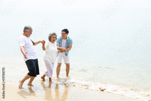 Happy asian family on the beach summer vacation. Vacation summer beach holidays background