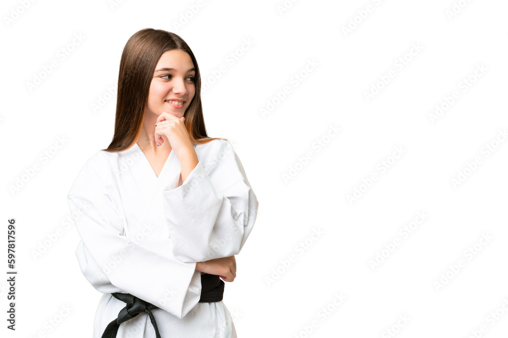 Teenager girl over isolated chroma key background looking side Teenager girl over isolated chroma key background looking side