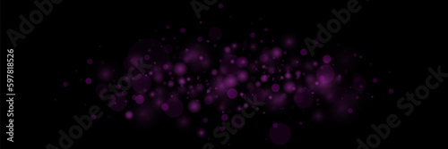 Bokeh particles, abstract background with shiny dust on black background.