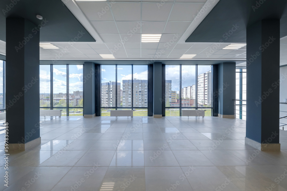 empty modern hall room with columns, doors and panoramic windows empty modern hall room with columns, doors and panoramic windows
