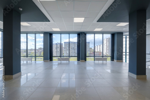 empty modern hall room with columns  doors and panoramic windows