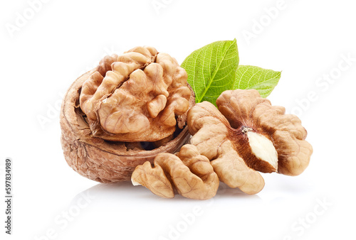 Walnuts kernel with leaves on white background