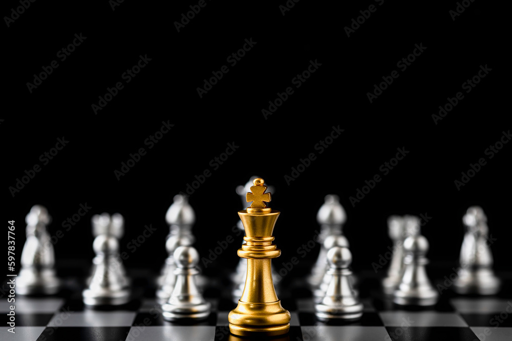 Golden King chess standing in front of other chess on chess board. Golden King chess standing in front of other chess on chess board.