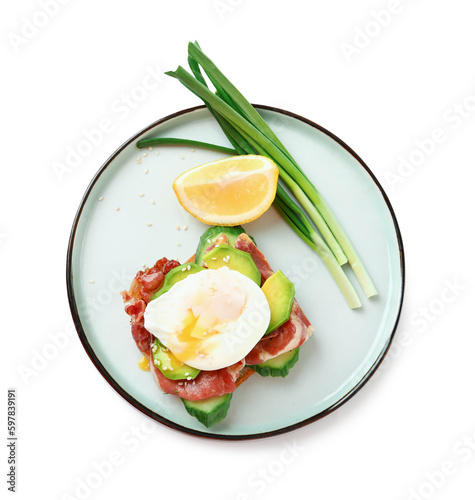 Plate with tasty egg Benedict isolated on white background