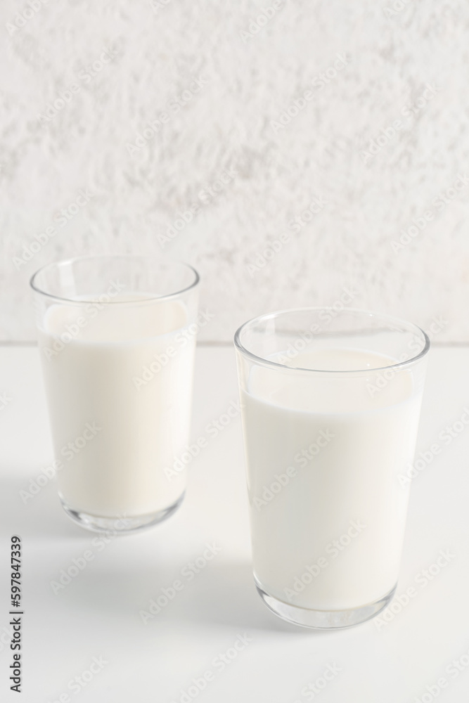 Glasses with fresh milk on white background Glasses with fresh milk on white background