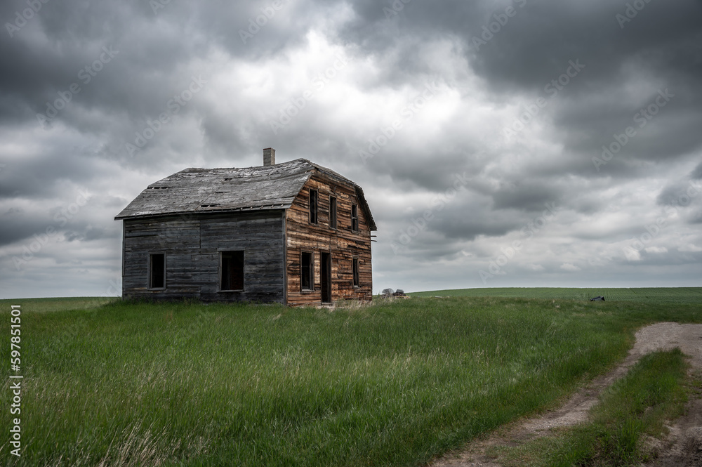 Old abandoned homestead on the open prairies. Old abandoned homestead on the open prairies.