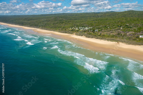 Aerial view of the beach of Eurong, Fraser Island (K'gari), a World Heritage-listed island along the south-eastern coast in the Wide Bay–Burnett region, Queensland, Australia.