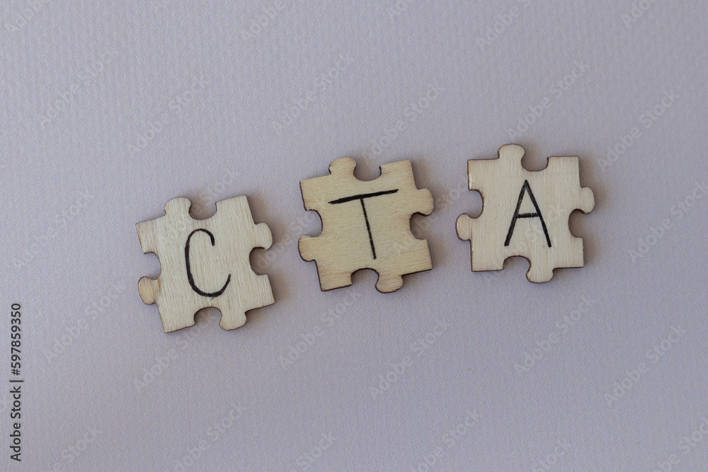 Obraz premium The acronym CTA, which stands for Call To Action. The letters written on the puzzles.