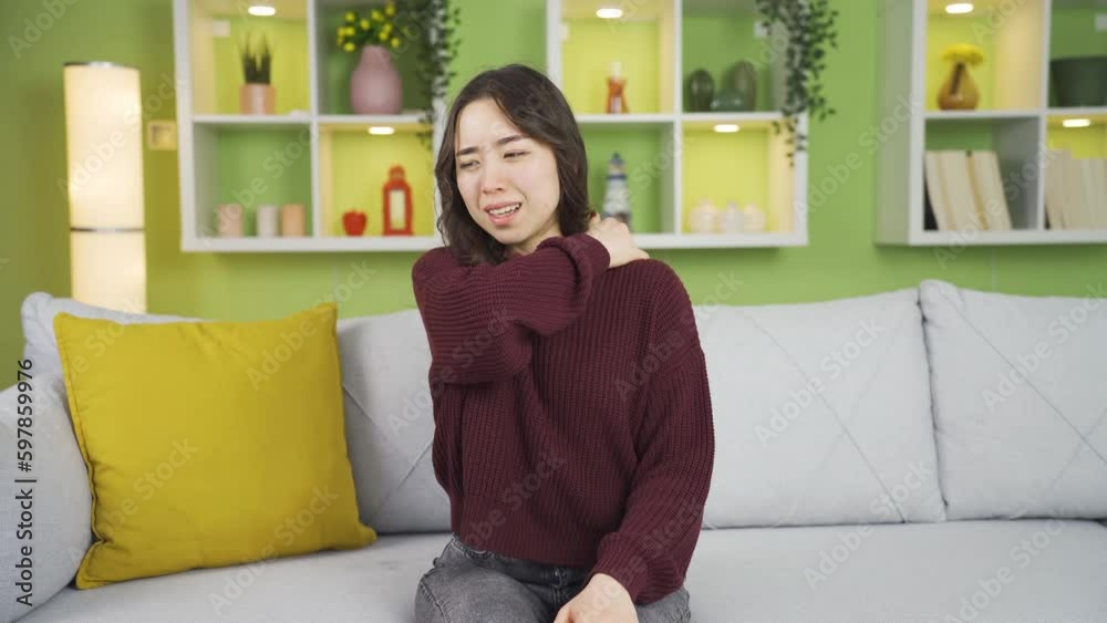 Asian young woman suffering from joint pains. Asian young woman suffering from joint pains.