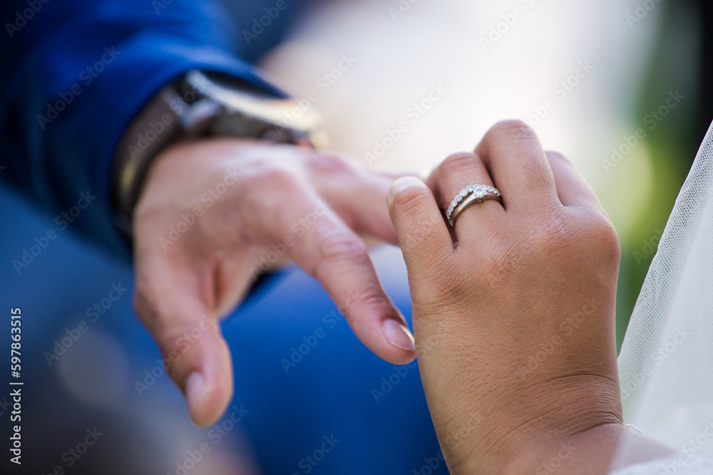 Intimate Moment of a couple Exchanging Wedding Rings at a wedding