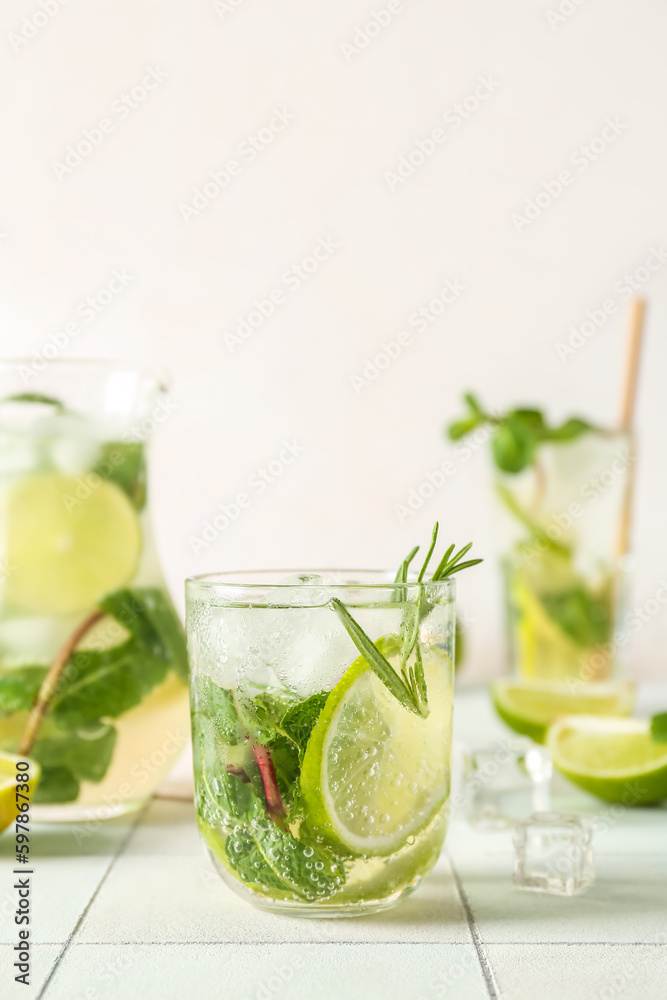 Fototapeta premium Glass of tasty mojito on table