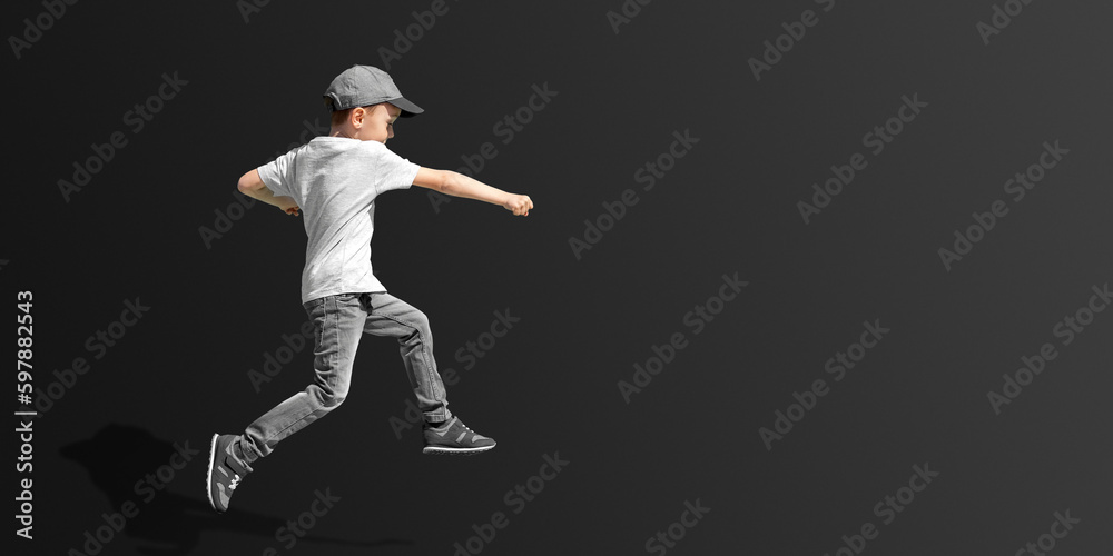 boy jumps on a color background