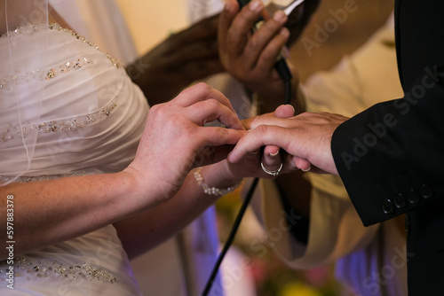 Intimate Moment of a couple Exchanging Wedding Rings at a wedding