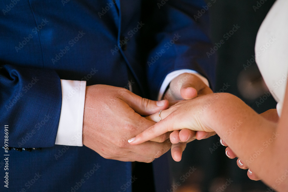 Intimate Moment of a couple Exchanging Wedding Rings at a wedding
