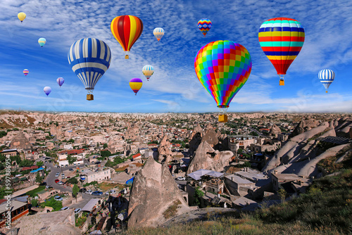 Hot air balloon flying over spectacular Cappadocia, Uchisar - Goreme, Turkey