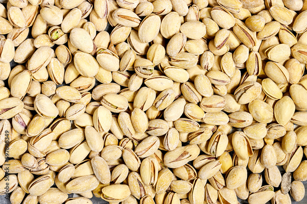 Pistachios texture and background . Tasty pistachios as background, as pistachios texture. flat lay Pistachios texture and background . Tasty pistachios as background, as pistachios texture. flat lay