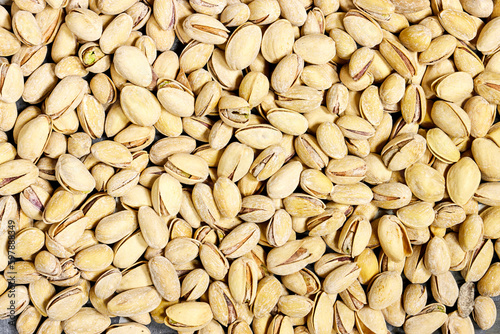 Pistachios texture and background . Tasty pistachios as background, as pistachios texture. flat lay