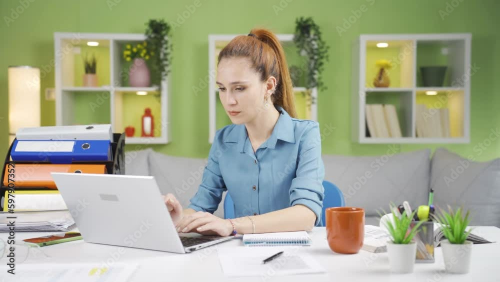 Successful woman working on laptop clapping. Successful woman working on laptop clapping.