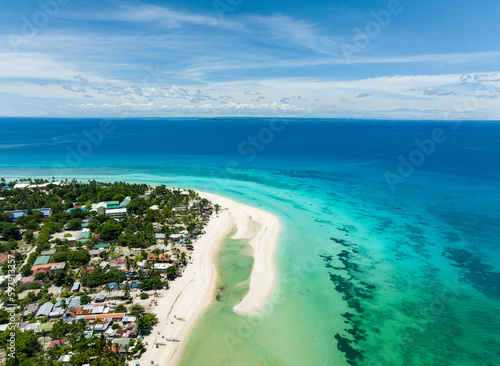 Aerial drone of tropical sandy beach with palm trees. Bantayan island, Philippines. photo