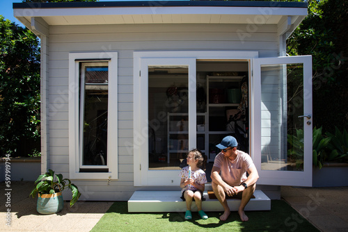 Modern hampton white grey backyard storage garden shed bike organise clever tidy tiny house father daughter child family