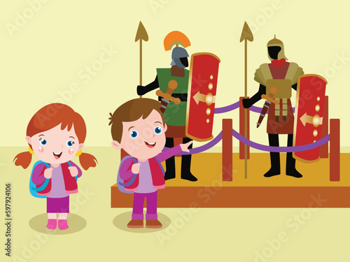 Children visiting a museum and looking at ancient military