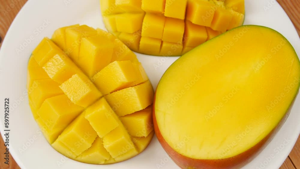 Sliced mango on a plate. Sliced mango on a plate.