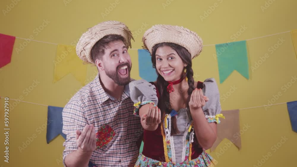 Brazilian couple, dressed in Junina party clothes, São João party. Protocol scenes.