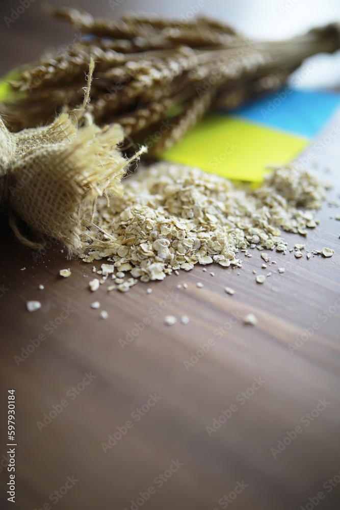 The concept of the cost of grain. 5000 ruble banknotes around a handful of ground grain. World hunger. The concept of the cost of grain. 5000 ruble banknotes around a handful of ground grain. World hunger.