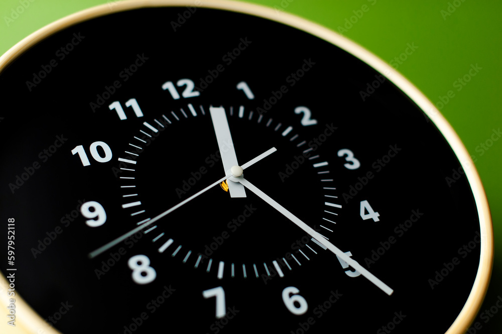 clock precious time alarm clock on green background concept of time working with time clock precious time alarm clock on green background concept of time working with time