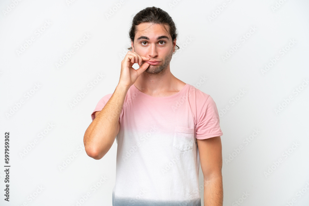 Caucasian handsome man isolated on white background showing a sign of silence gesture Caucasian handsome man isolated on white background showing a sign of silence gesture