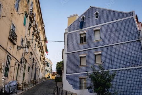 Tenement house with traditional azulejo tiles facade in Lisbon city, Portugal photo