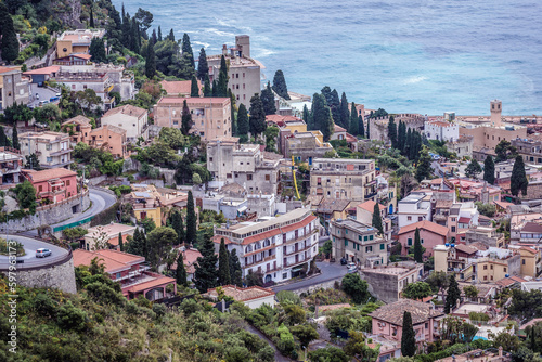 Taormina city on Sicily Island, aerial view from Castelmola town, Italy photo