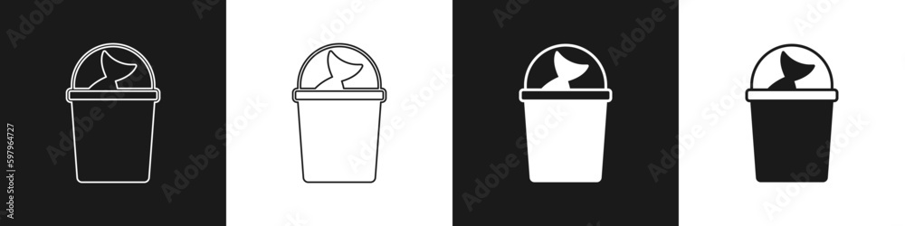 Set Fishing bucket with fish icon isolated on black and white background. Fish in a bucket. Vector Set Fishing bucket with fish icon isolated on black and white background. Fish in a bucket. Vector
