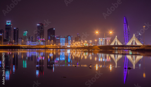 Manama illuminated downtown on the shore of Persian gulf, Manama, Bahrain