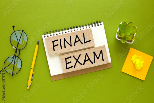 bright green background glasses and a plant in a pot.text Final Exam.