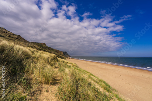 Fototapeta Naklejka Na Ścianę i Meble -  Walk five minutes from the old mining village of Skinningrove and you reach the fabulous Cattersty Sands and its quiet, clean beach backed by sand dunes.