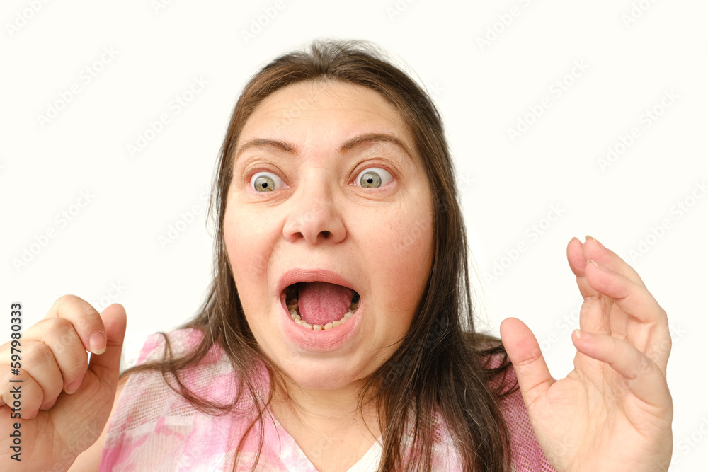 closeup face mature woman 55 years old with grimace of horror in fear, open mouth, shocked by news, threw up her hands, thinks about problems, stress piled up, concept human health, life reflections