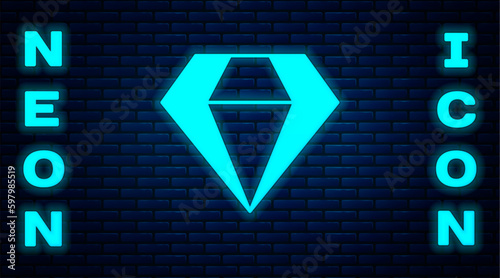 Glowing neon Diamond icon isolated on brick wall background. Jewelry symbol. Gem stone. Vector