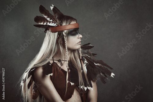 Profile portrait of female shaman photo