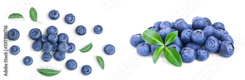 fresh ripe blueberry with leaves isolated on white background . Top view. Flat lay pattern