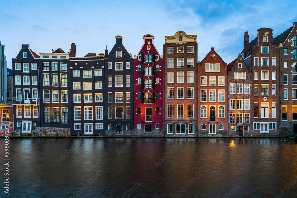 Typical dutch houses by the canal in Amsterdam, Holland