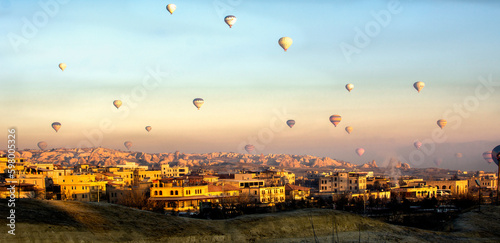 Mountain landscape with hot air balloons in the sky in cappadocia . Travel and adventure concept in Turkey