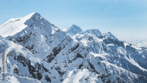 Beautiful snowy peaks of the Caucasus Mountains. Krasnaya Polyana Rosa Khutor Ski Resort, Russia. © Elenglush