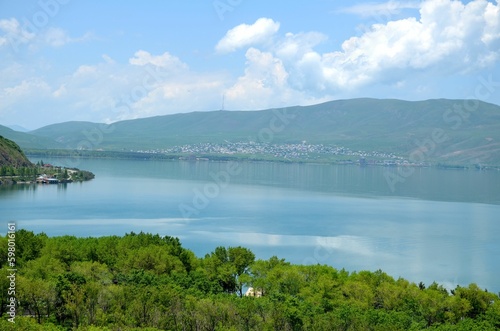 beautiful shore of Lake Sevan with clouds and mountain range  Armenia