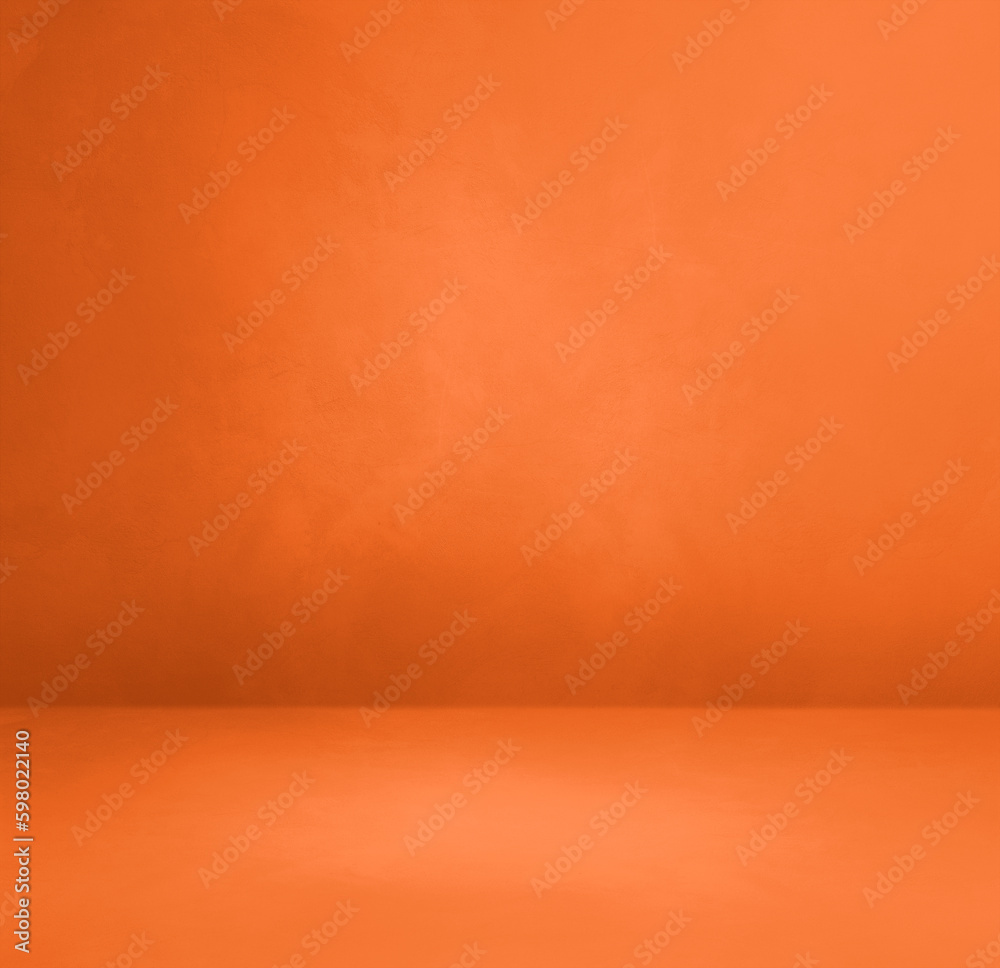 Empty neon orange concrete interior background Empty neon orange concrete interior background