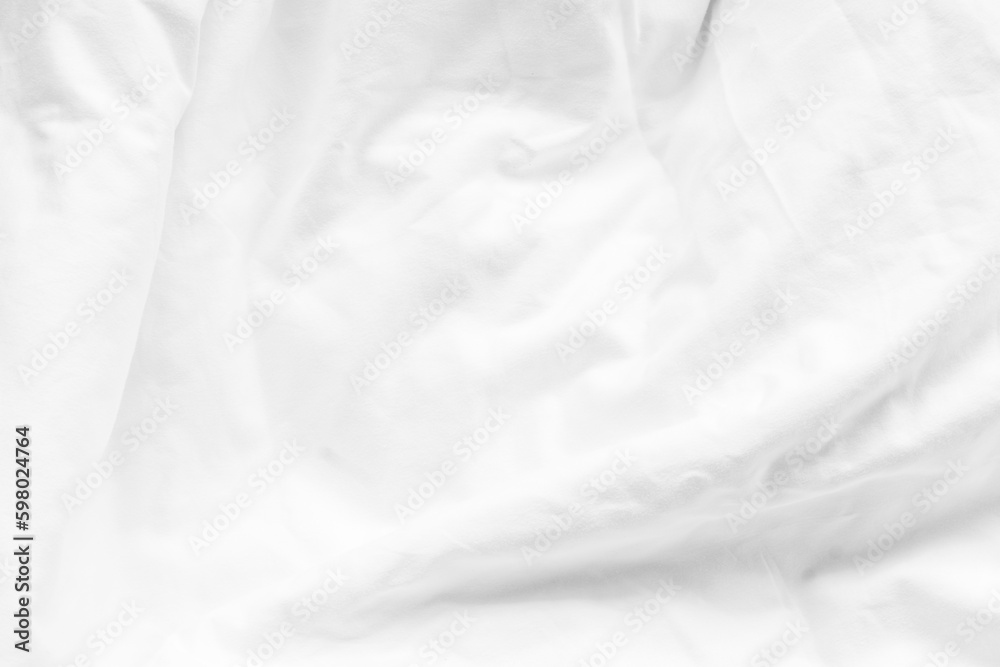 White bed sheet background, wrinkled duvet, crumpled blanket comforter cloth used in hotel, resort or home interior for bedding and sleep comfort