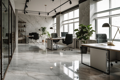 Modern open-plan office with marble flooring  desks  computers  without people.