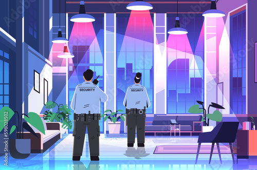 security guards in uniform using walkie-talkie in night office public or private safety concept