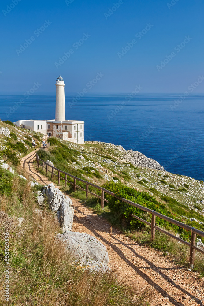 Scenic view of cliff path on the sea Punta Palascia lighthouse on background. Otranto, Lecce